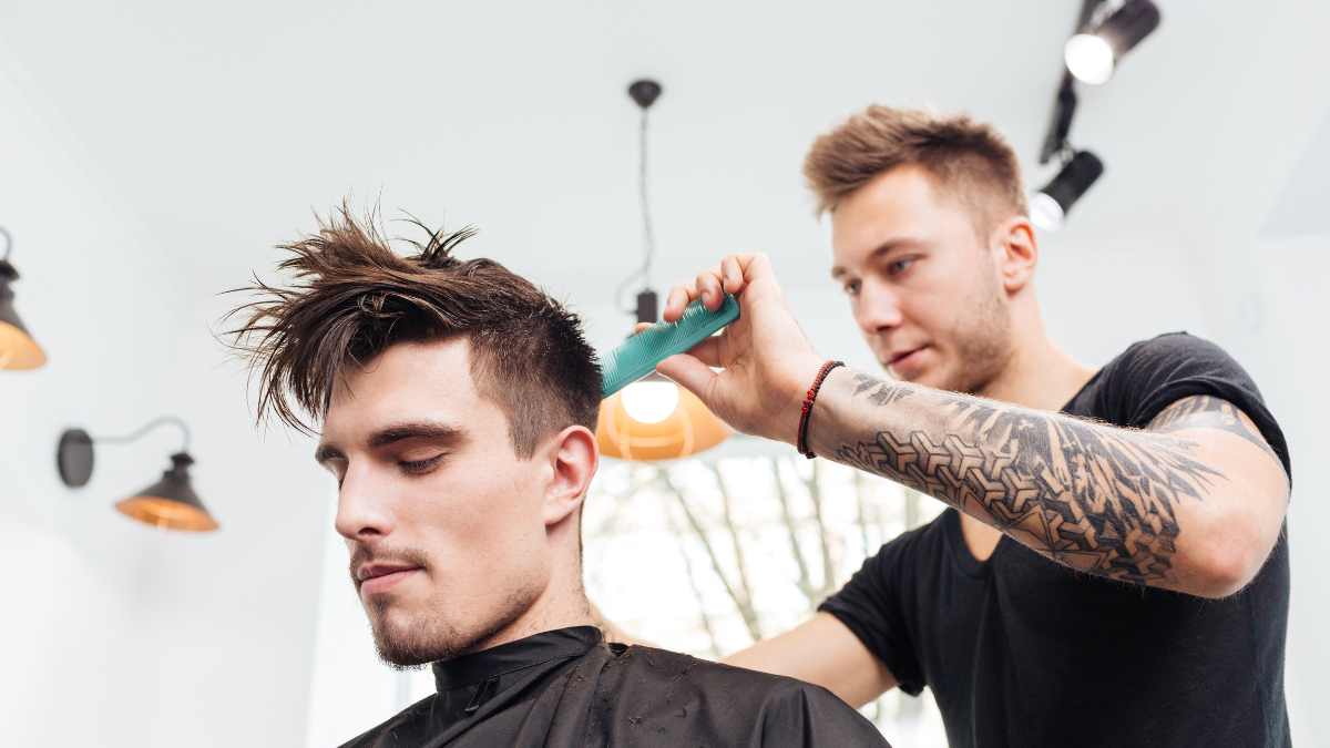 A man with Fluffy Hair at the barber's shop